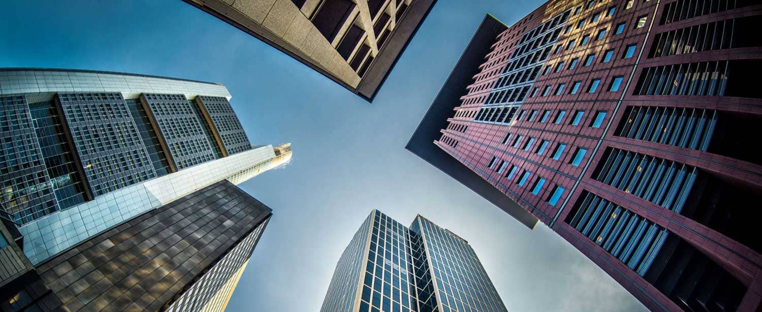 View from the ground looking up at skyscrapers